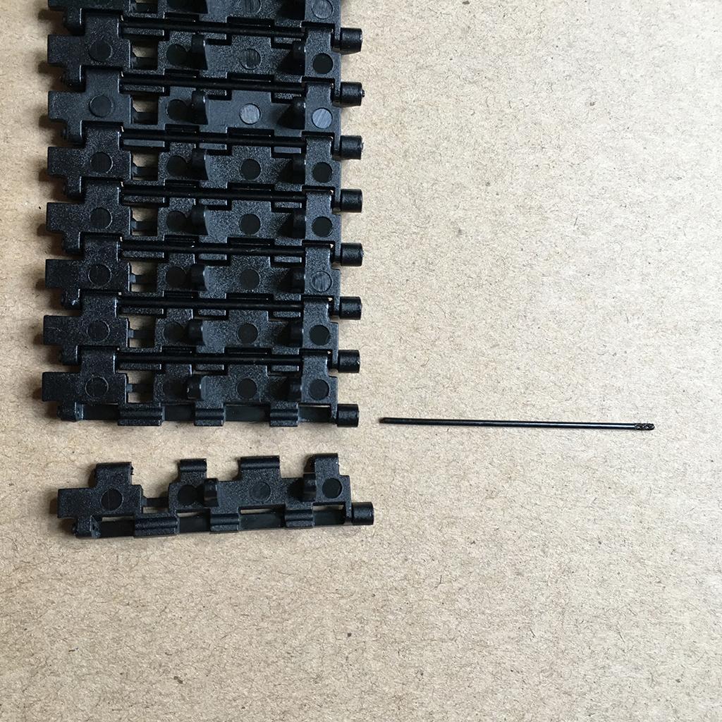 Zwarte tankketting van kunstst - Xcm Chain recensie en prijs